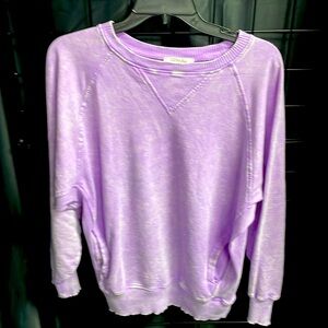 Brand new zenana sweatshirt with side pockets.Size medium.